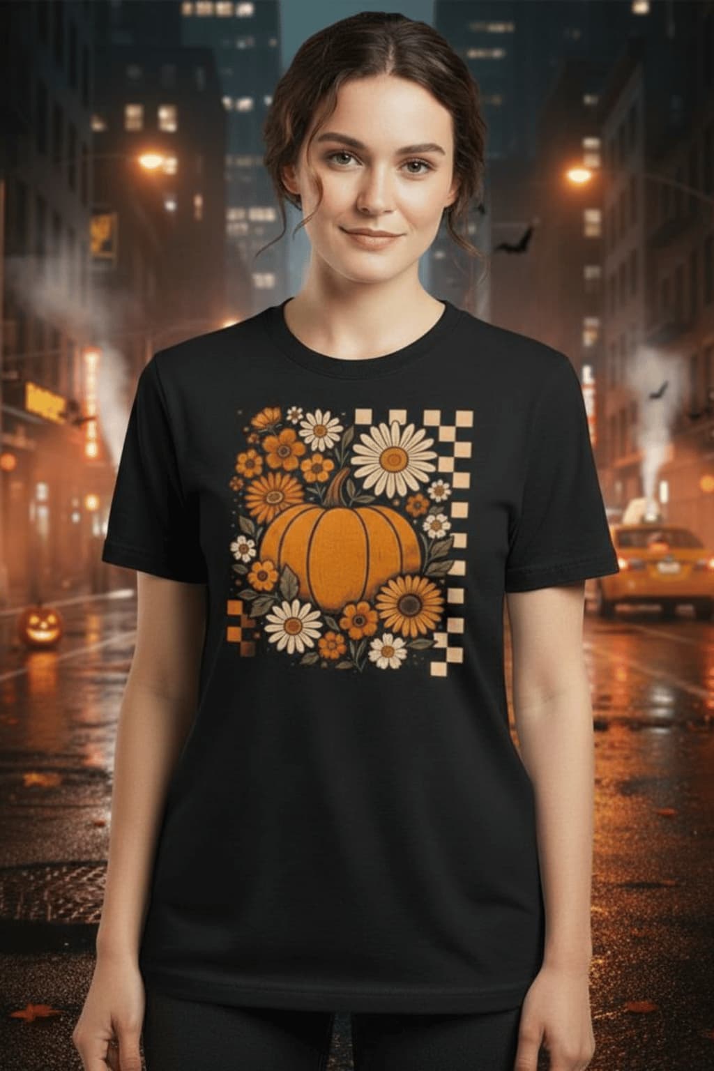 Black unisex t-shirt with pumpkin and fall flowers design, perfect for Halloween season - Vibe Wear Hub